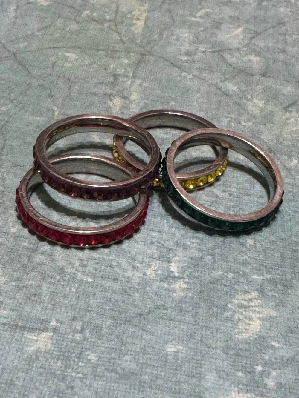 SET OF FOUR STACKABLE STAINLESS STEEL RINGS